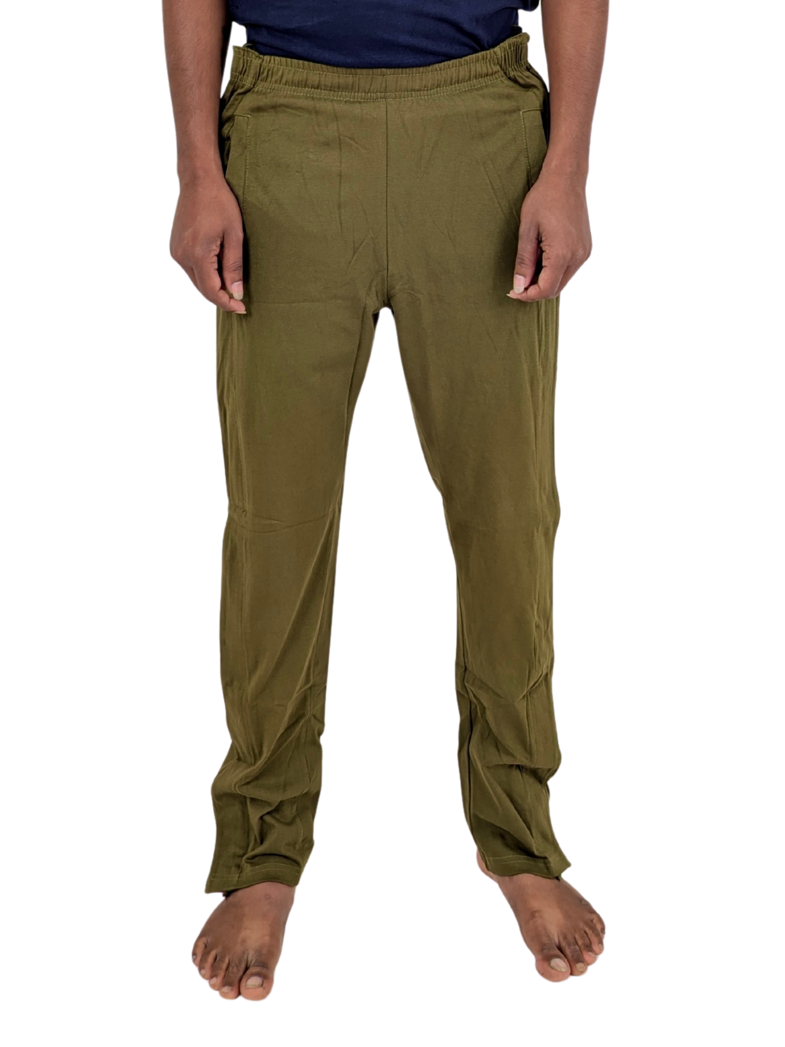 Person wearing olive green pants on a white background