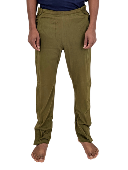Person wearing olive green pants on a white background