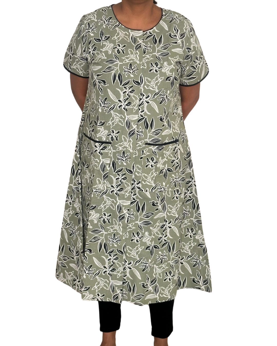 Fully front open gown with large front pokcets in green color with floral print