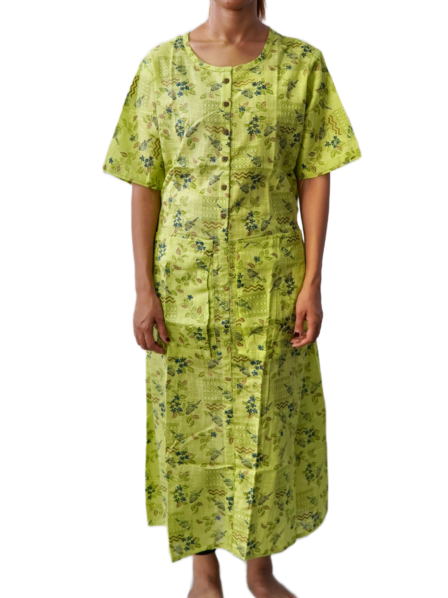 Woman wearing a green floral dress on a white background