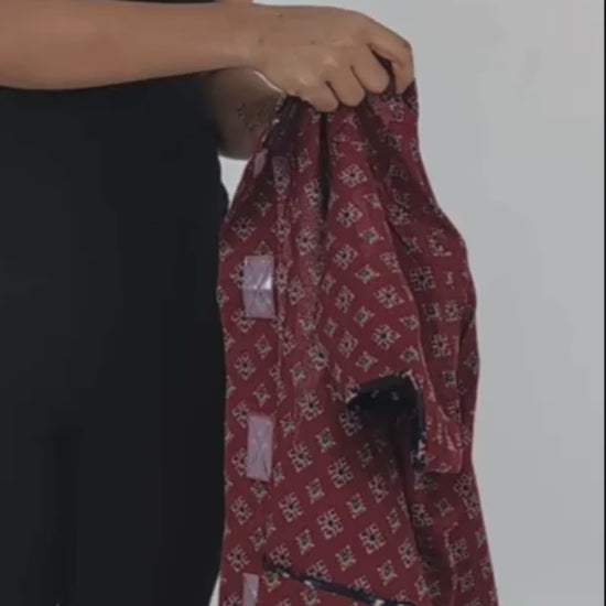 Video demonstrating how to wear front open gown